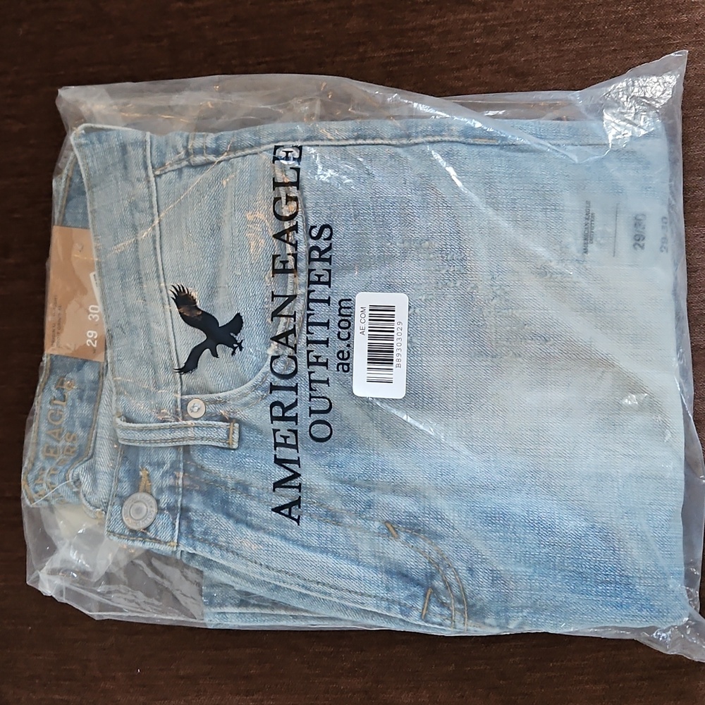 Men's or boys original straight leg American Eagle blue jeans.